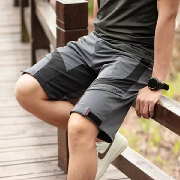 Detalle del ruedo y las costuras rojas del short de ciclismo Rockbros YPK020 gris