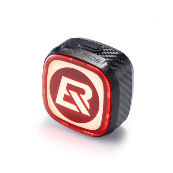 Luz trasera Rockbros Q2MAX encendida con el logo ROCKBROS